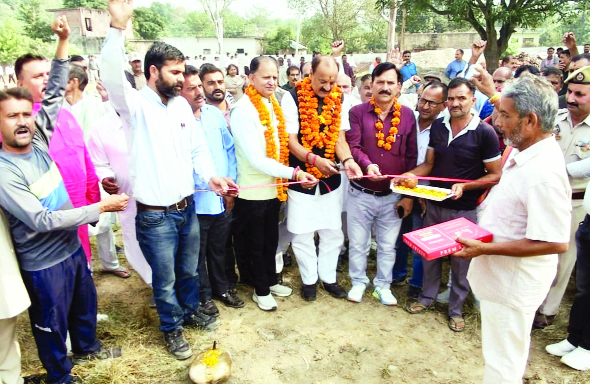 Slathia reviews health sector, lays foundation of school building