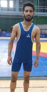 Mr. Anis Ahmed, student of Govt. Degree College, Chenani won the first match of Wrestling in 57 Kg weight category in the inter-collegiate tournament organised by the University of Jammu.